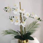 White Artificial Orchid In Ceramic Vase